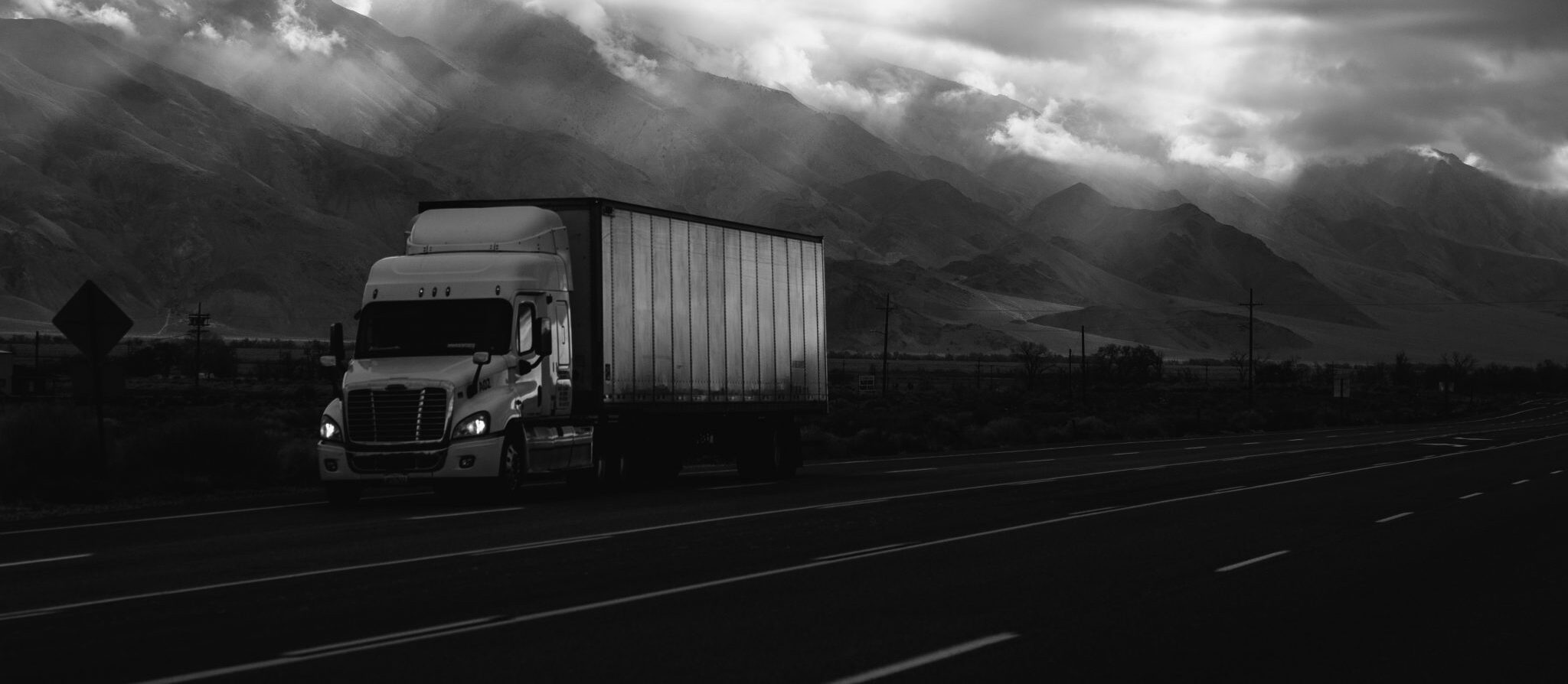 Road freight vehicles at a logistics terminal